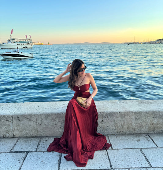 Pleated maxi dresses for women with halter neck and cut out waist