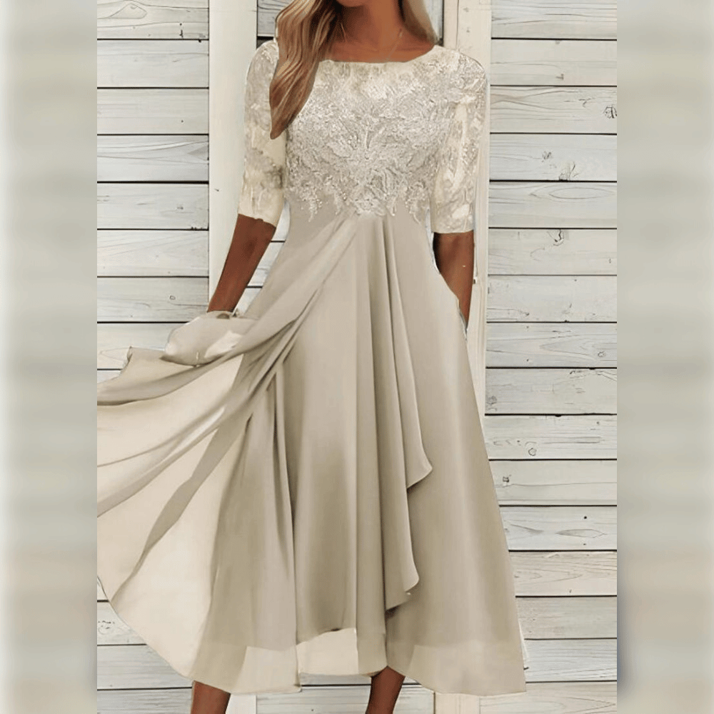Wedding guest dress for women with lace bodice and layered asymmetric hem
