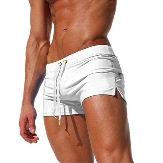 Fitted short leg board shorts for men with side split hems and zip pocket