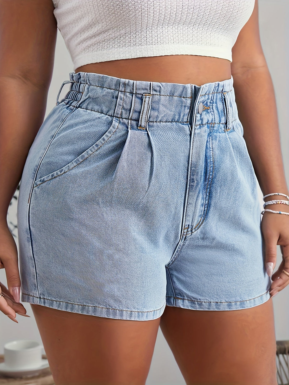 Womens shorts with high rise paperbag waist and button fly
