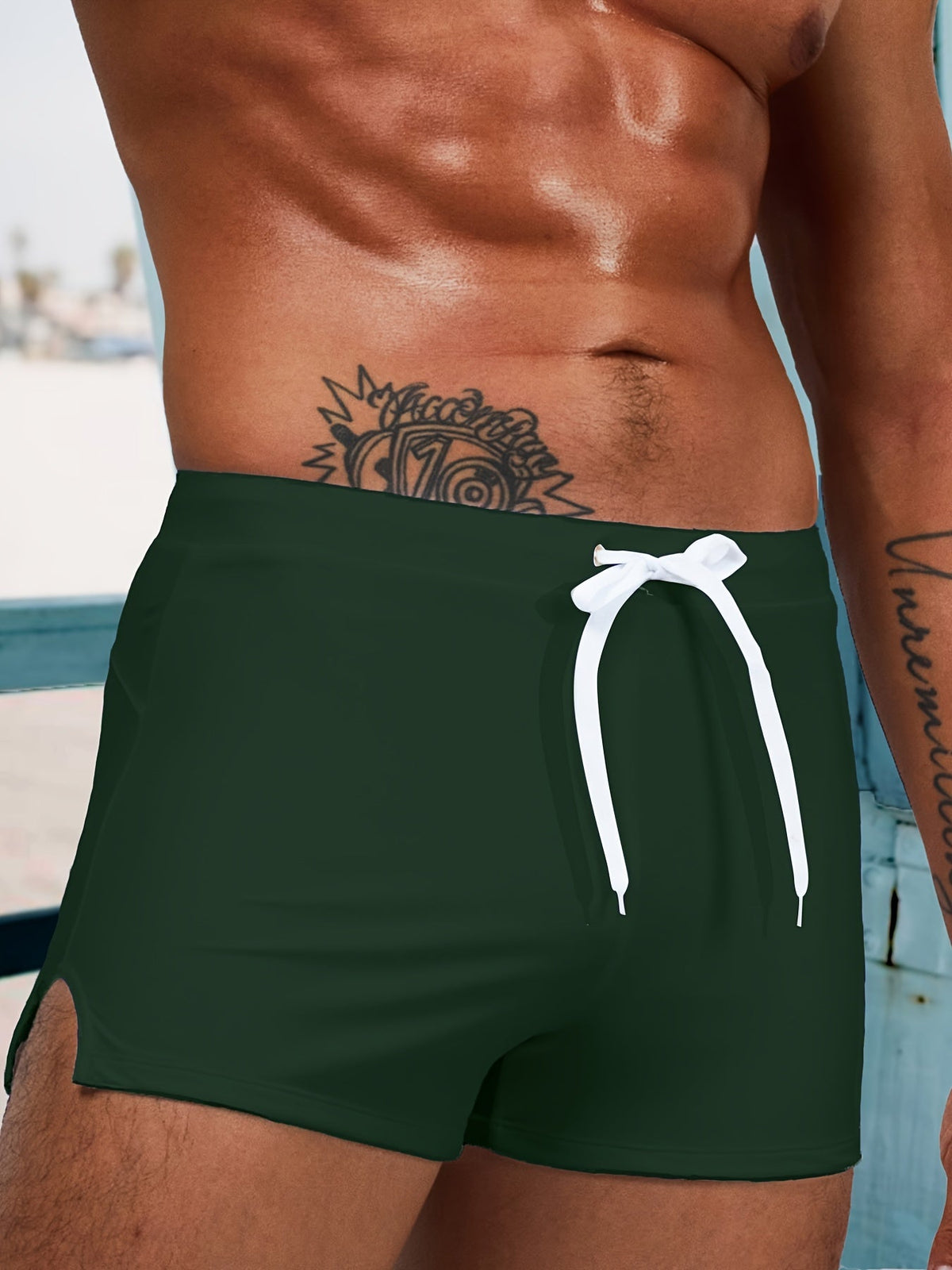 Short length fitted board shorts for men with drawstring waist and side split hem