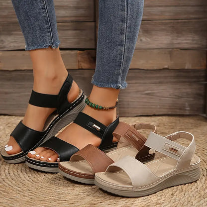Women sandals with open toe, wedge heel and hook and loop ankle strap