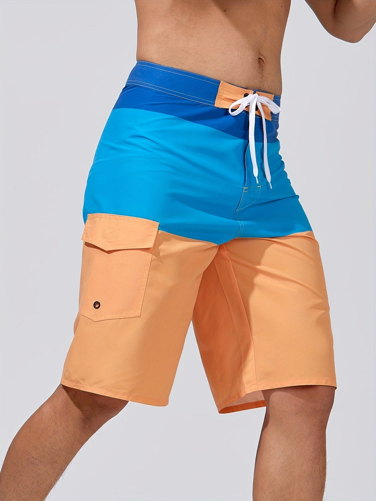 Knee-length board shorts for men with drawstring waist and flap cargo pocket