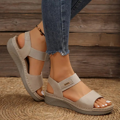 Women sandals with open toe, wedge heel and hook and loop ankle strap