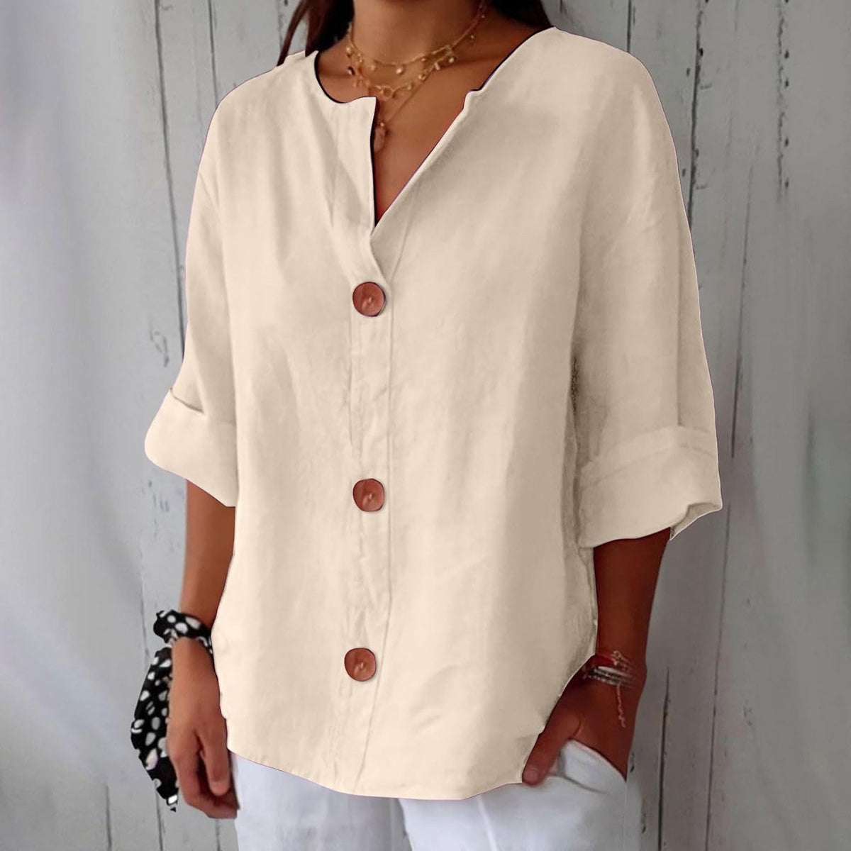 Button up blouse for women with v-neck and three quarter sleeves