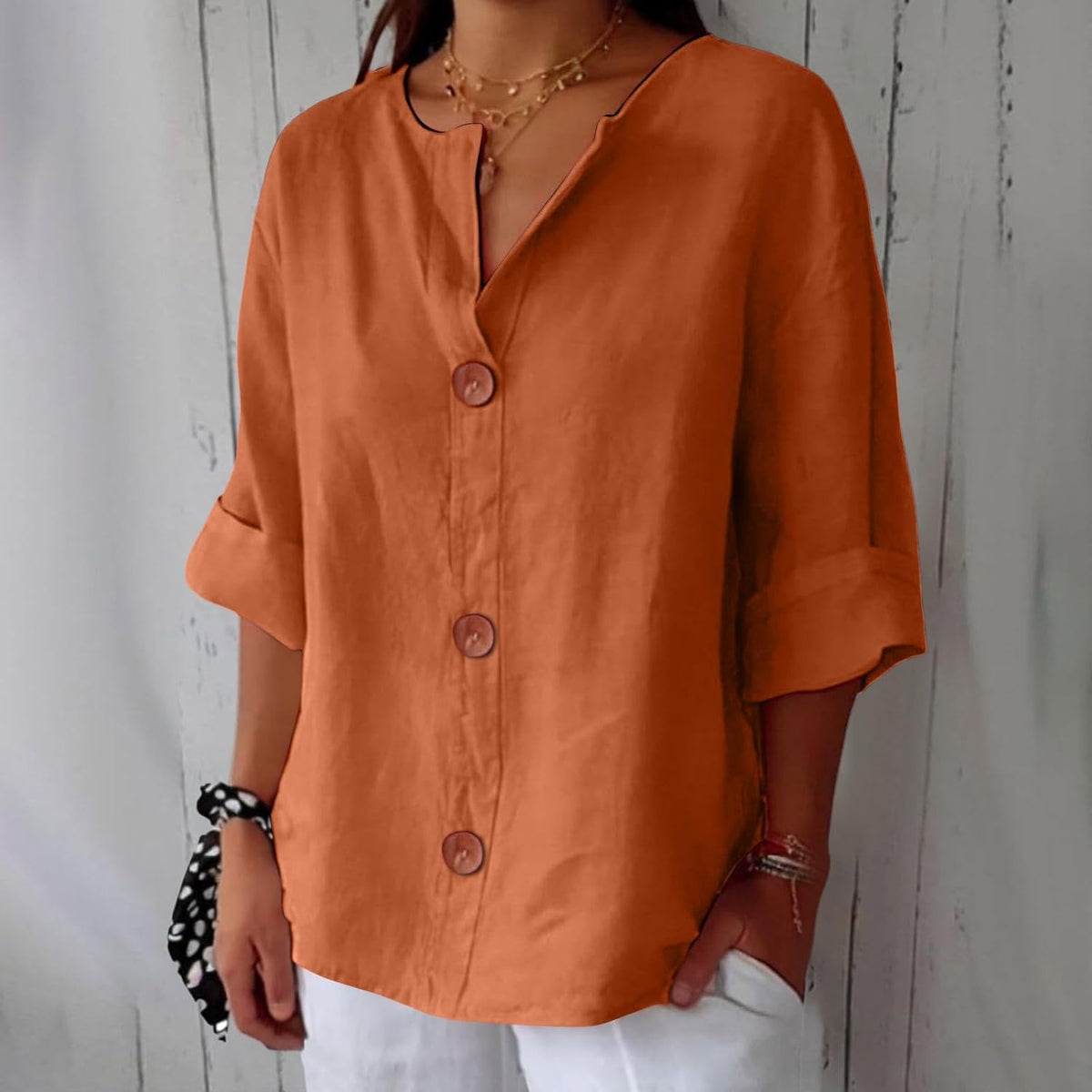 Button up blouse for women with v-neck and three quarter sleeves
