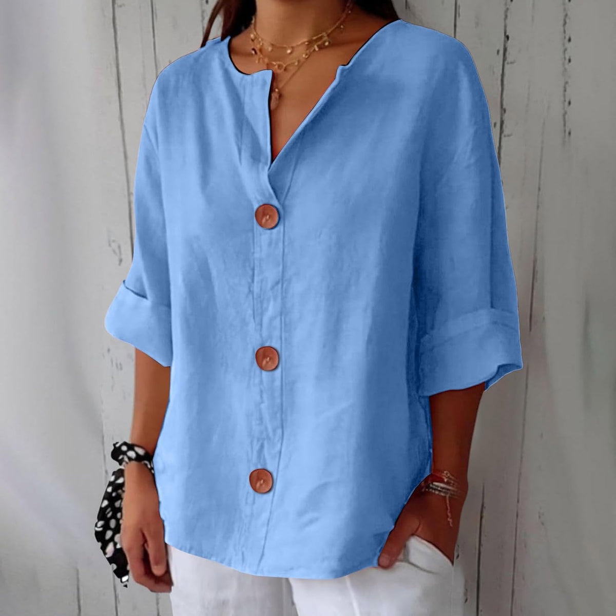 Button up blouse for women with v-neck and three quarter sleeves