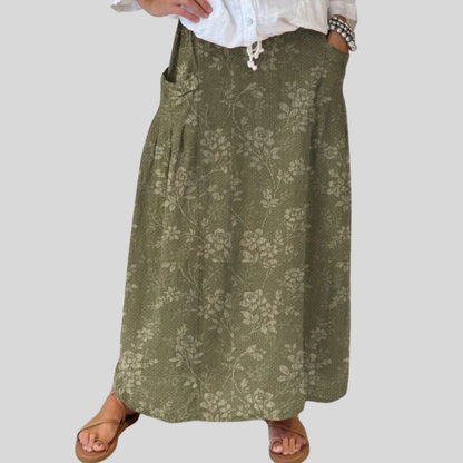Maxi skirt for women with elastic waist, side pockets and floral print