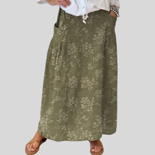 Maxi skirt for women with elastic waist, side pockets and floral print