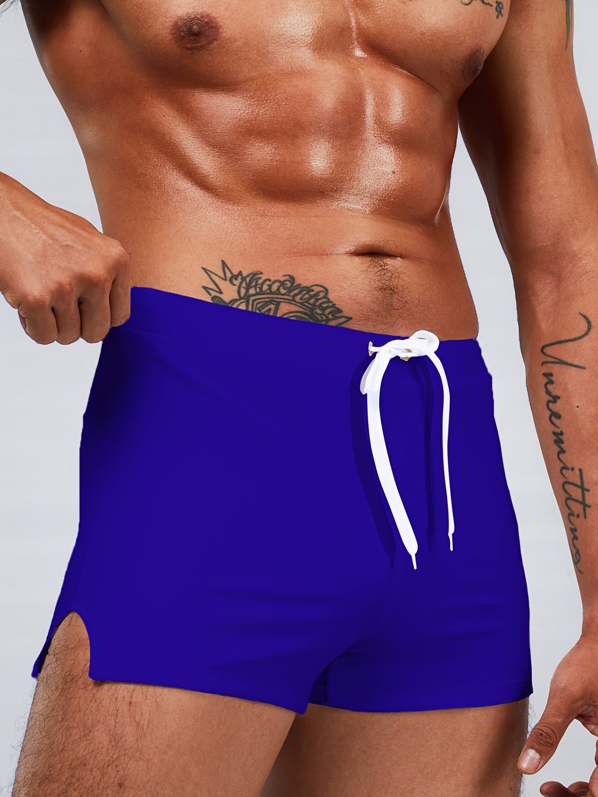 Short length fitted board shorts for men with drawstring waist and side split hem