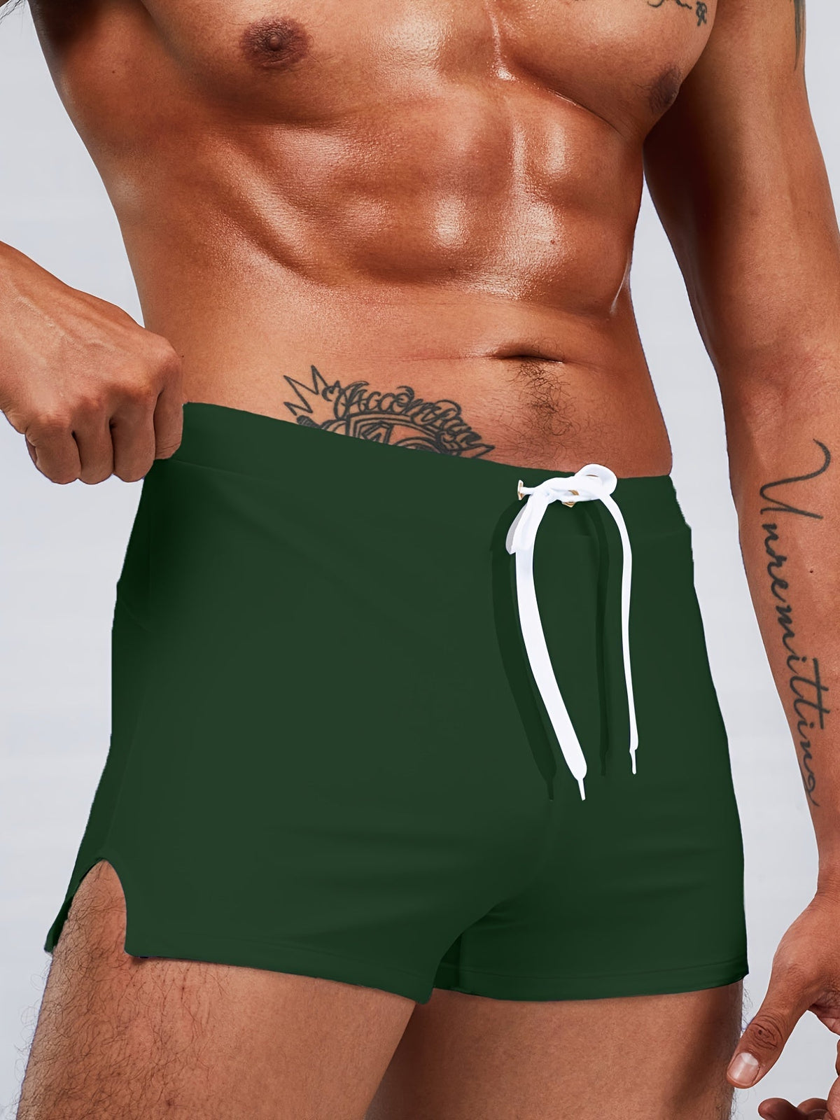 Short length fitted board shorts for men with drawstring waist and side split hem