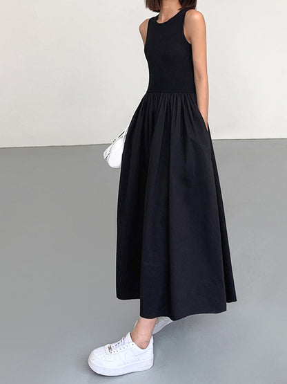 Sleeveless maxi dresses for women with crew neck and gathered skirt