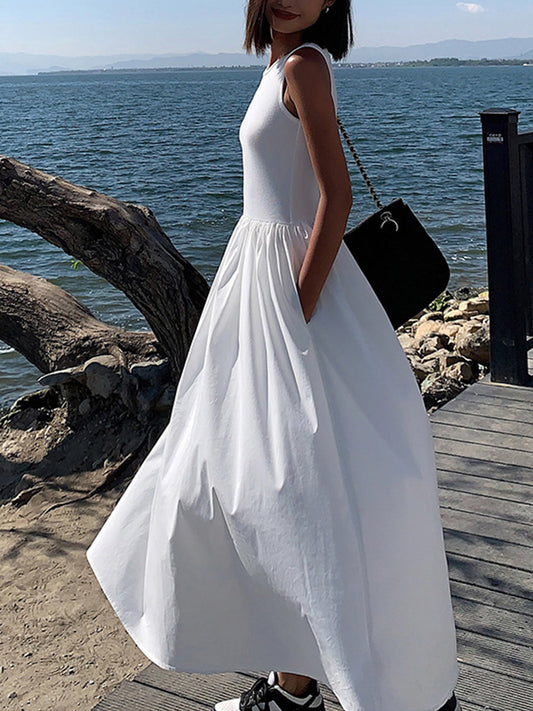 Sleeveless maxi dresses for women with crew neck and gathered skirt