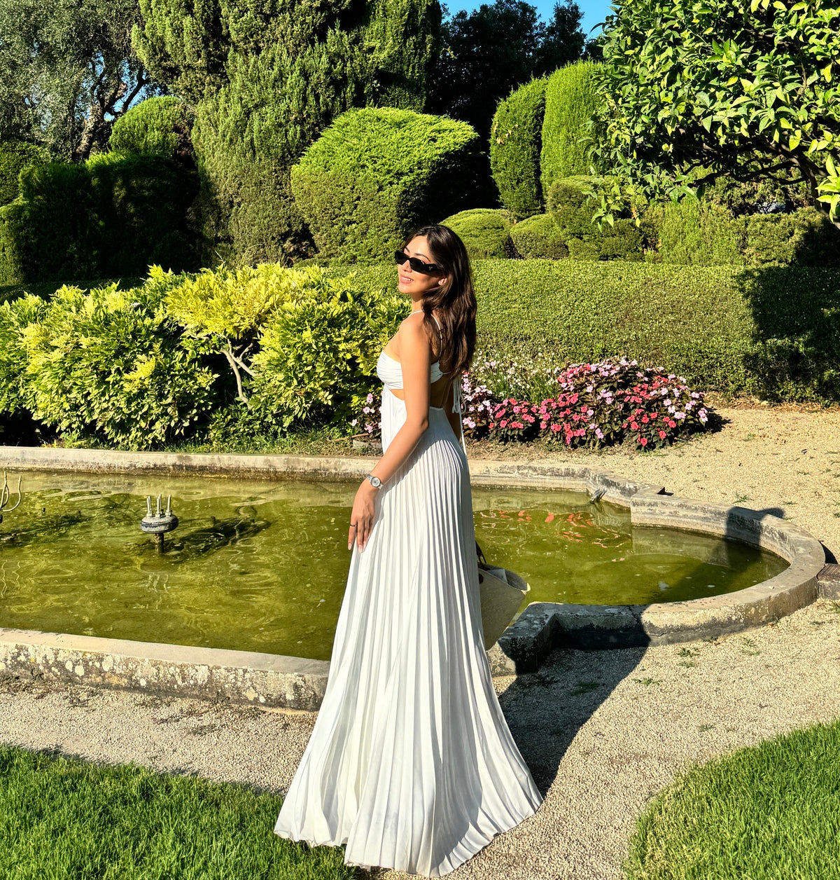 Pleated maxi dresses for women with halter neck and cut out waist