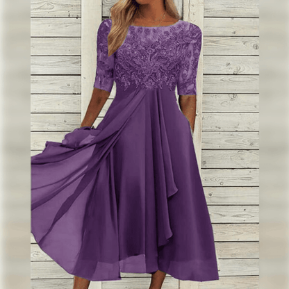 Wedding guest dress for women with lace bodice and layered asymmetric hem