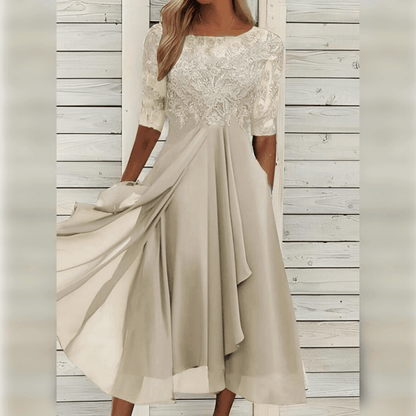 Wedding guest dress for women with lace bodice and layered asymmetric hem