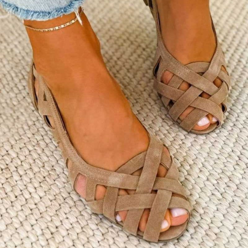 Women sandals with woven cut out straps and peep toe flat design