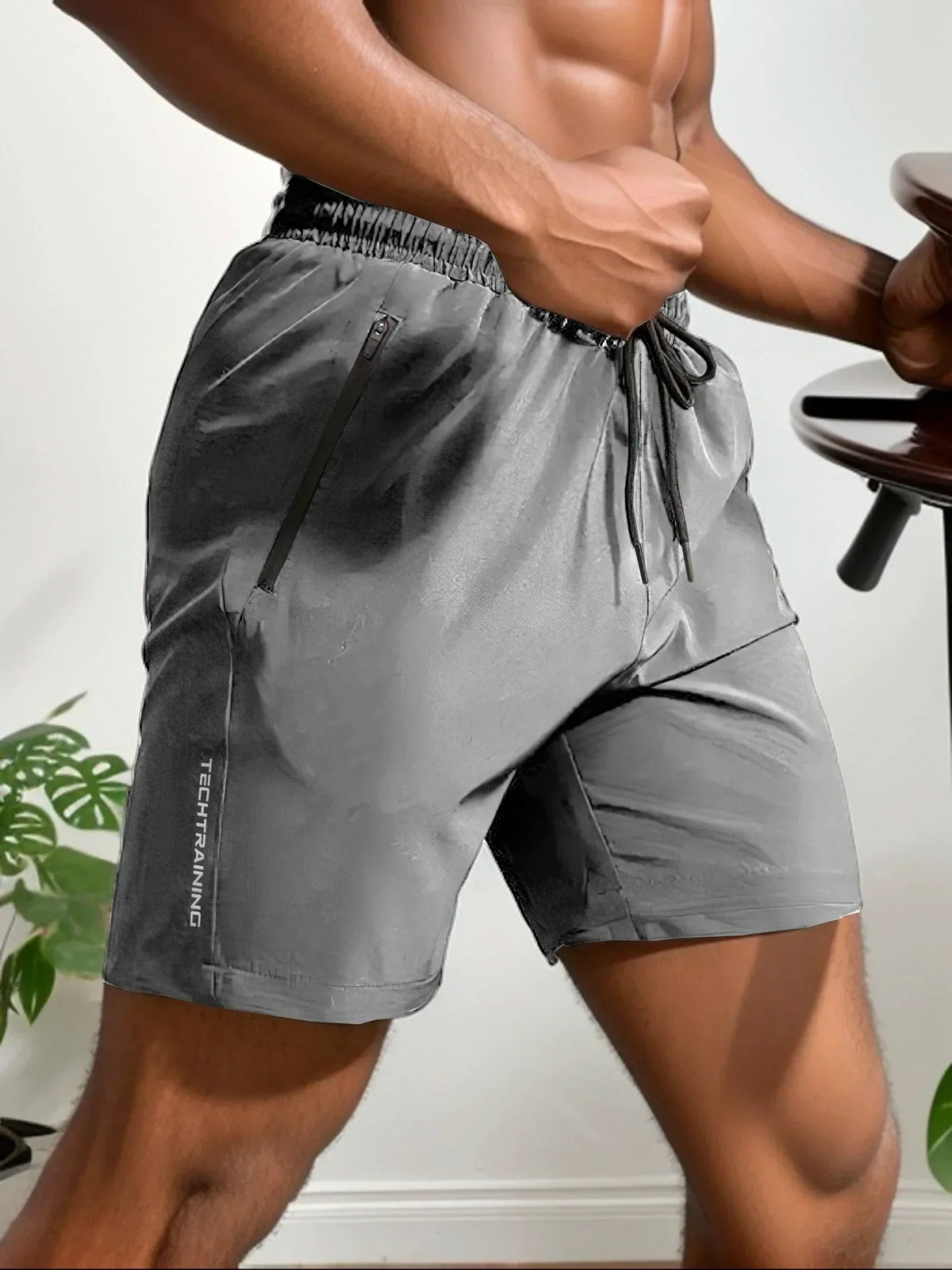 Mens shorts with zip pockets and drawstring waist for running