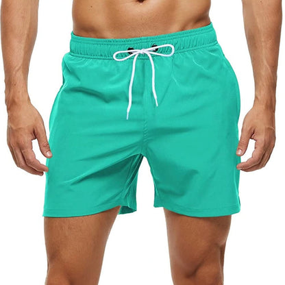 Board shorts for men with side zip pocket, hem vents and above-knee length