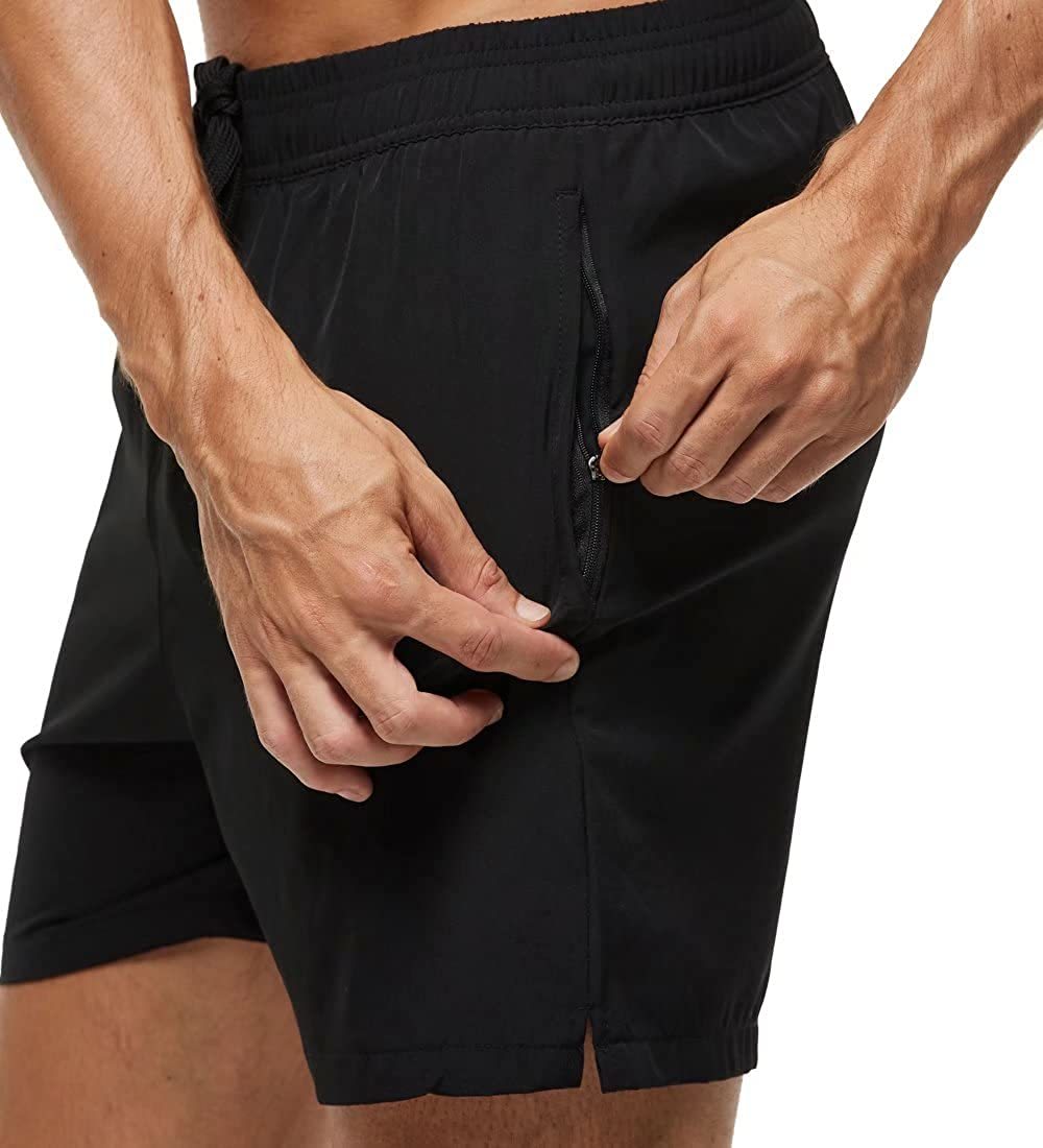 Board shorts for men with side zip pocket, hem vents and above-knee length