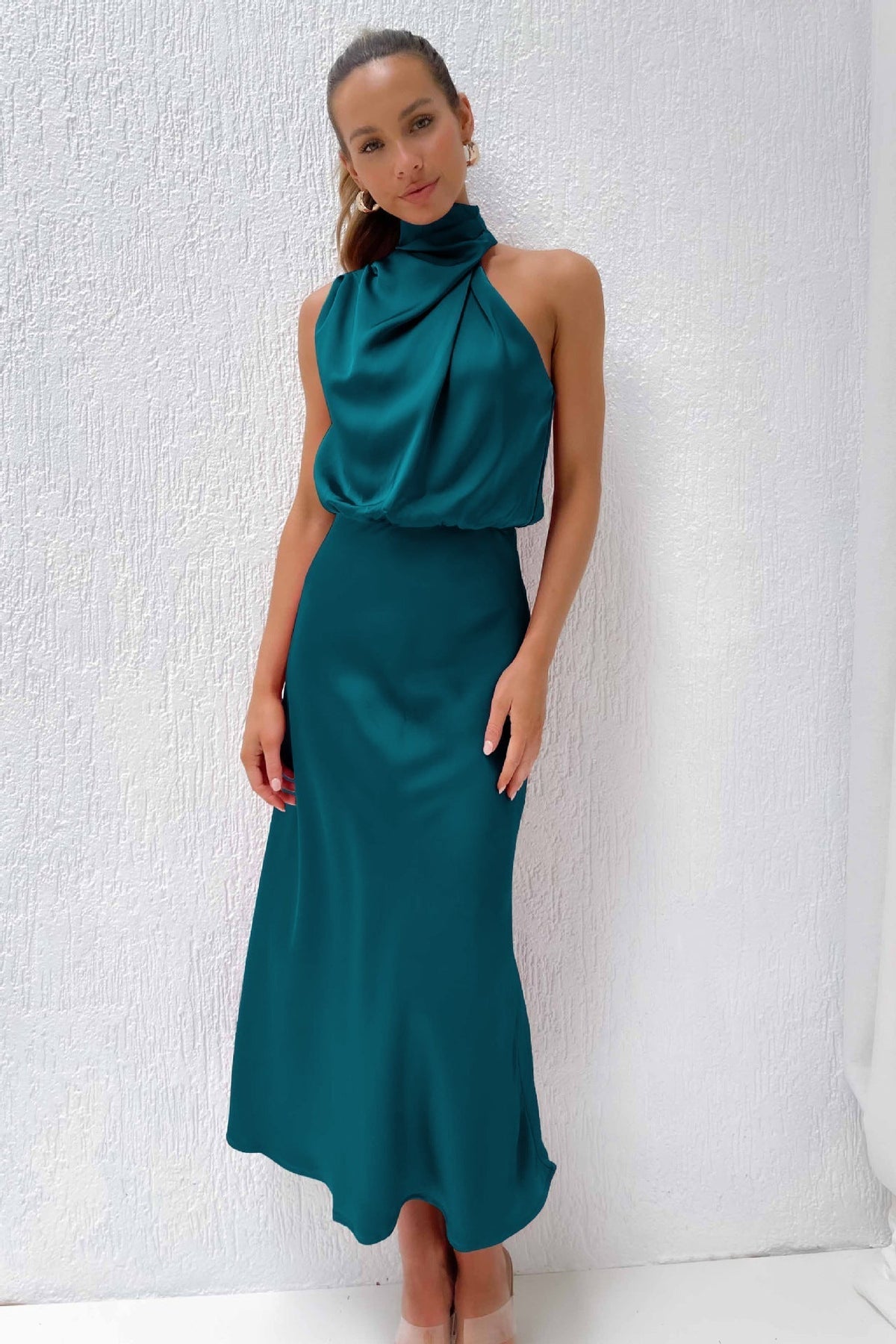 Halter neck formal dresses for women with a midi length and satin finish
