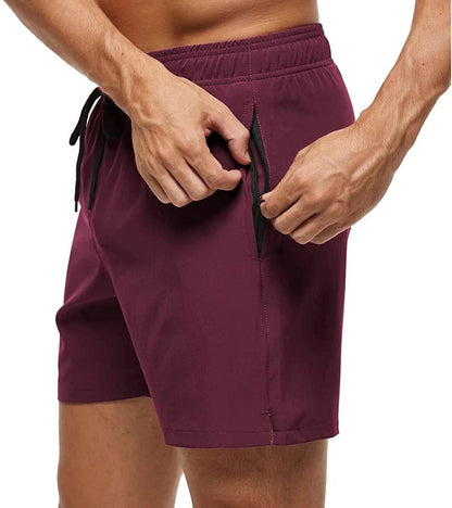 Board shorts for men with side zip pocket, hem vents and above-knee length