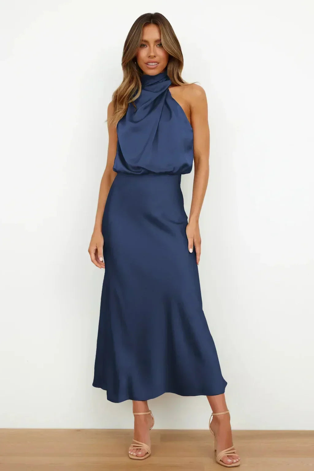 Halter neck formal dresses for women with a midi length and satin finish