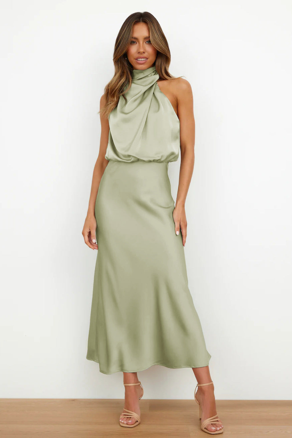 Halter neck formal dresses for women with a midi length and satin finish