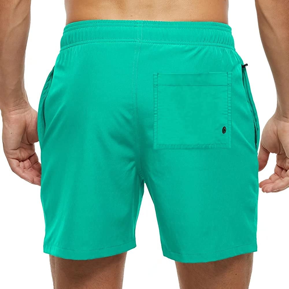 Board shorts for men with side zip pocket, hem vents and above-knee length