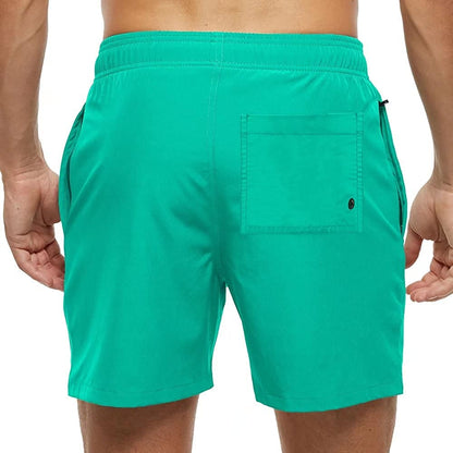 Board shorts for men with side zip pocket, hem vents and above-knee length
