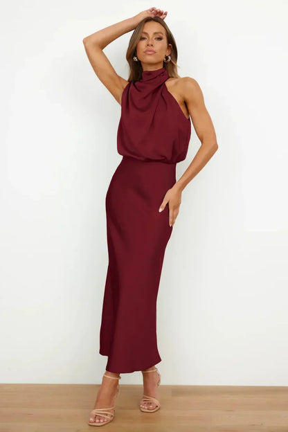 Halter neck formal dresses for women with a midi length and satin finish