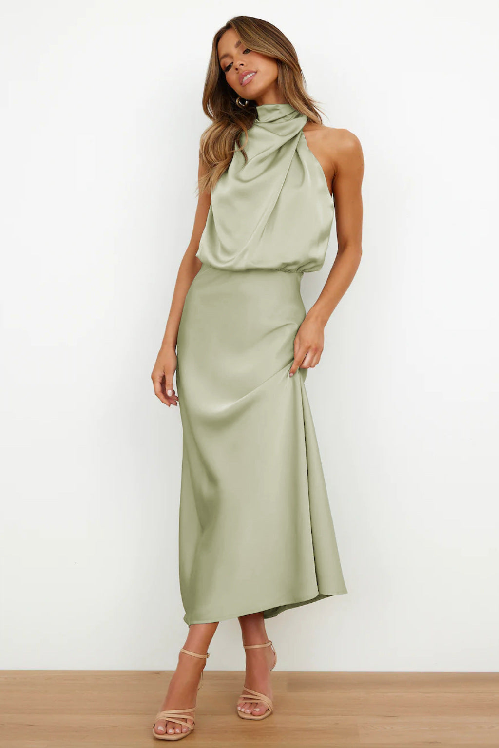 Halter neck formal dresses for women with a midi length and satin finish