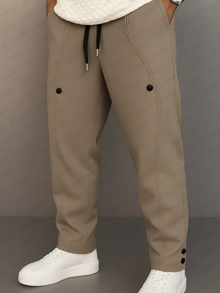 Track pants for men with drawstring waist and button hem detail