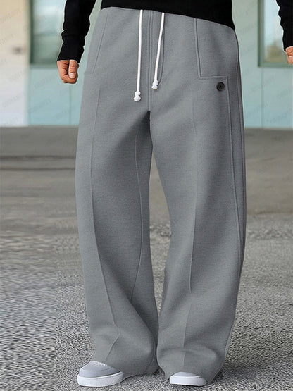 Wide leg track pants with drawstring waist and side pockets