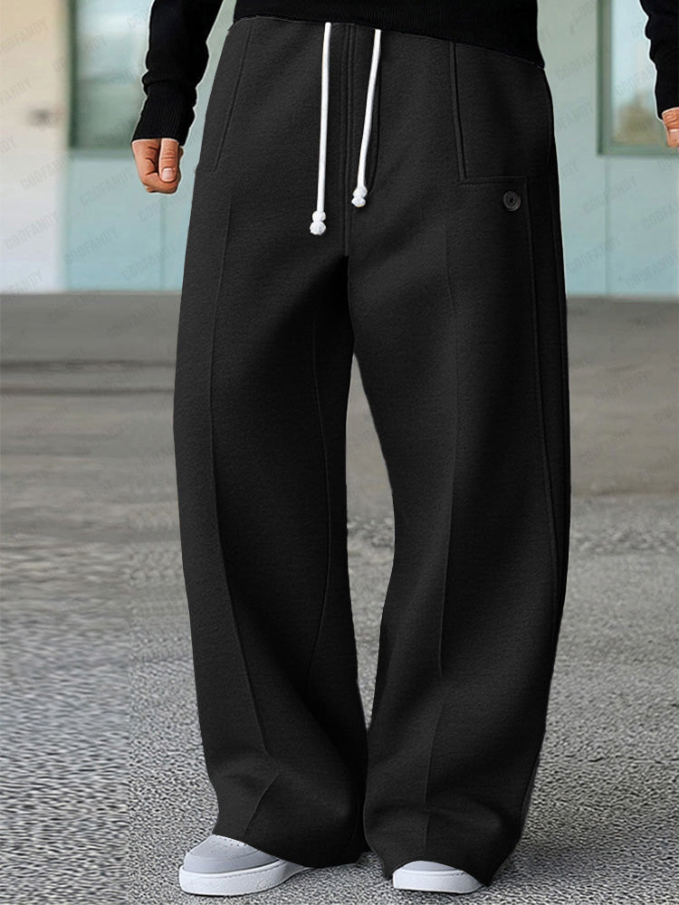 Wide leg track pants with drawstring waist and side pockets