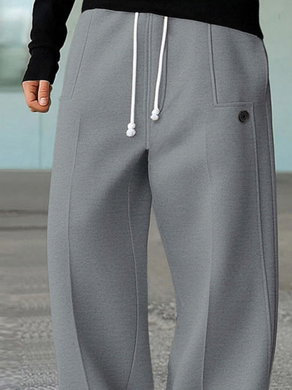 Wide leg track pants with drawstring waist and side pockets