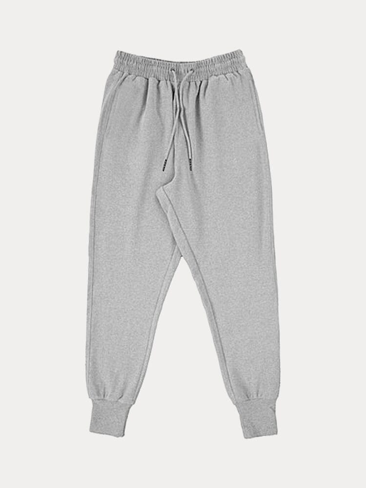Track pants for men with drawstring waist and cuffed hems
