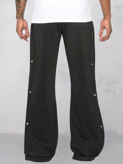 Flared track pants for men with paisley side panel and snap buttons