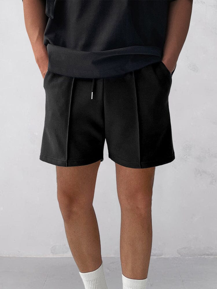 Mens shorts with elastic drawstring waist and pintuck detail