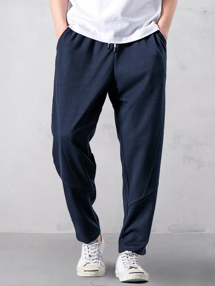 Track pants for men with tapered leg and drawstring waist