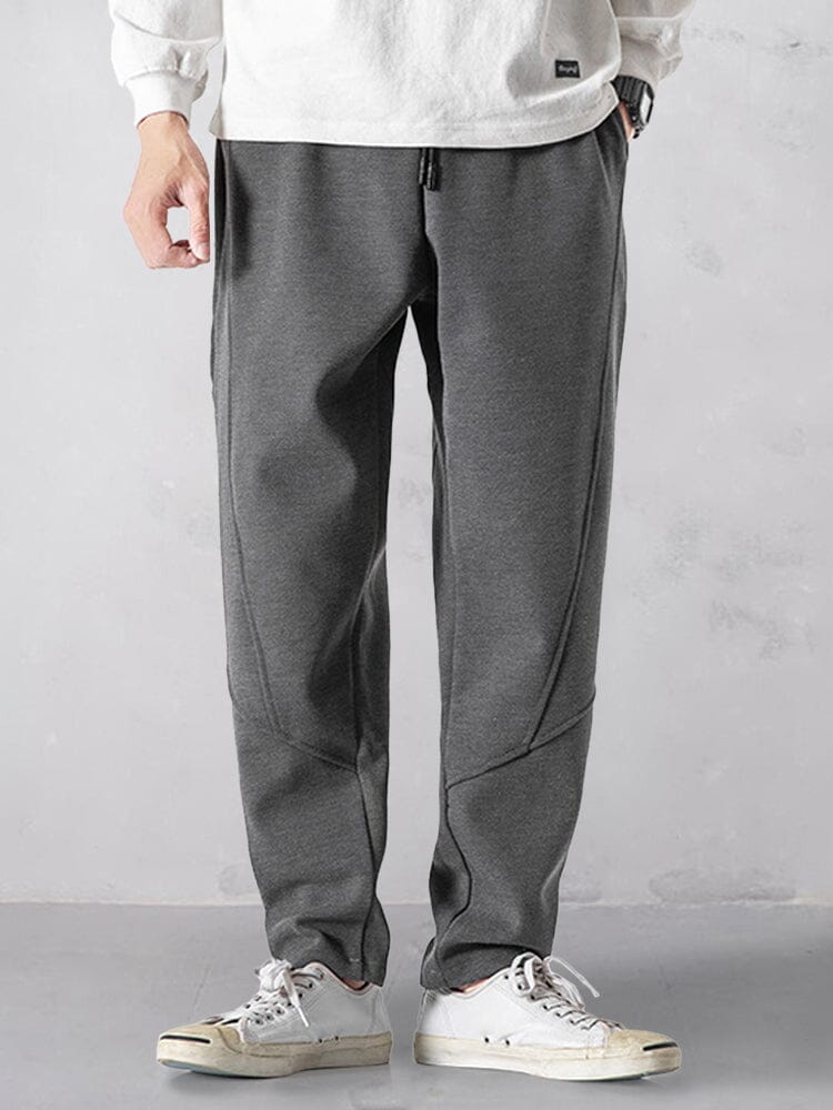 Track pants for men with tapered leg and drawstring waist