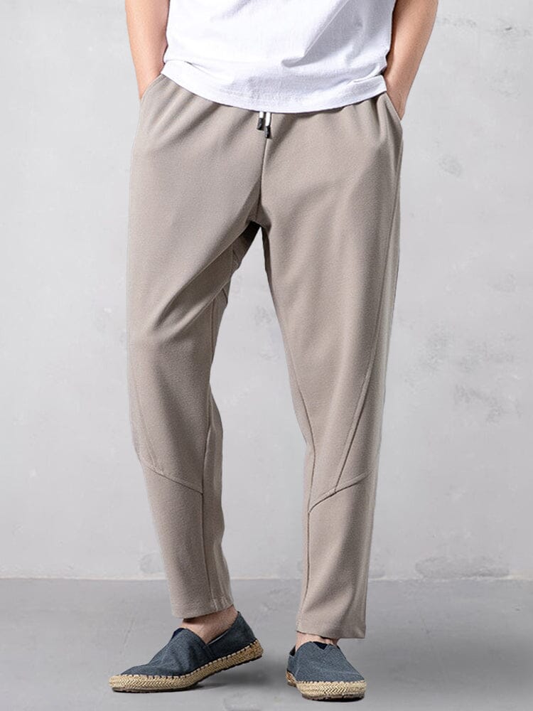 Track pants for men with tapered leg and drawstring waist