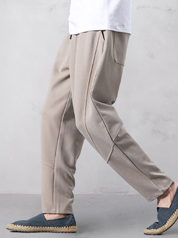 Track pants for men with tapered leg and drawstring waist