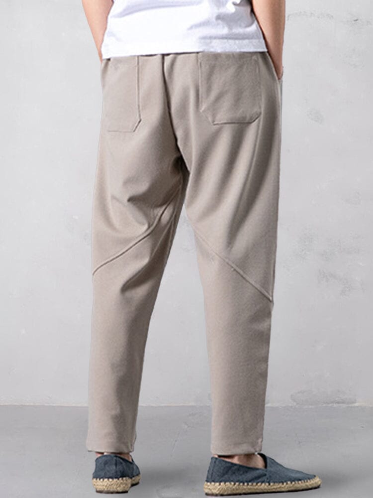 Track pants for men with tapered leg and drawstring waist