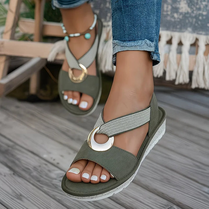 Women sandals with open toe, crossover straps and ring detail