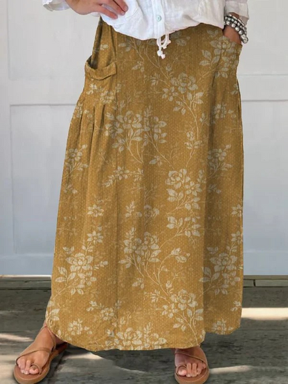 Maxi skirt for women with elastic waist, side pockets and floral print