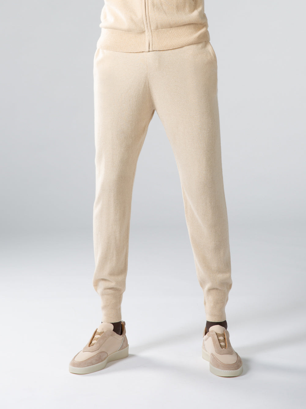 Knitted track pants for men with drawstring waist and ribbed cuffs