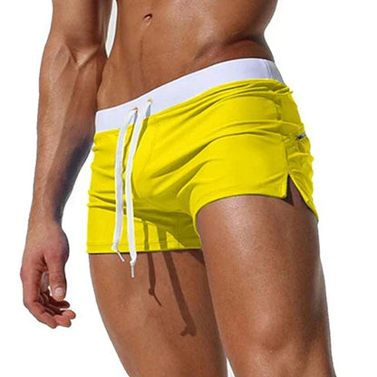 Fitted short leg board shorts for men with side split hems and zip pocket