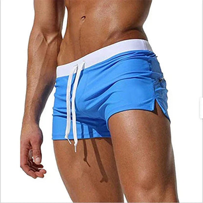 Fitted short leg board shorts for men with side split hems and zip pocket