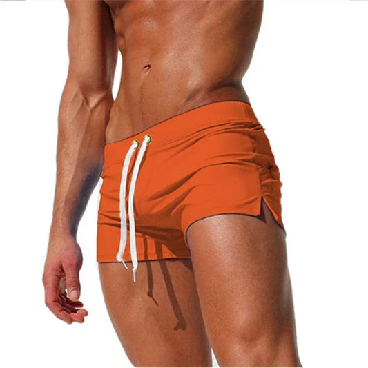 Fitted short leg board shorts for men with side split hems and zip pocket